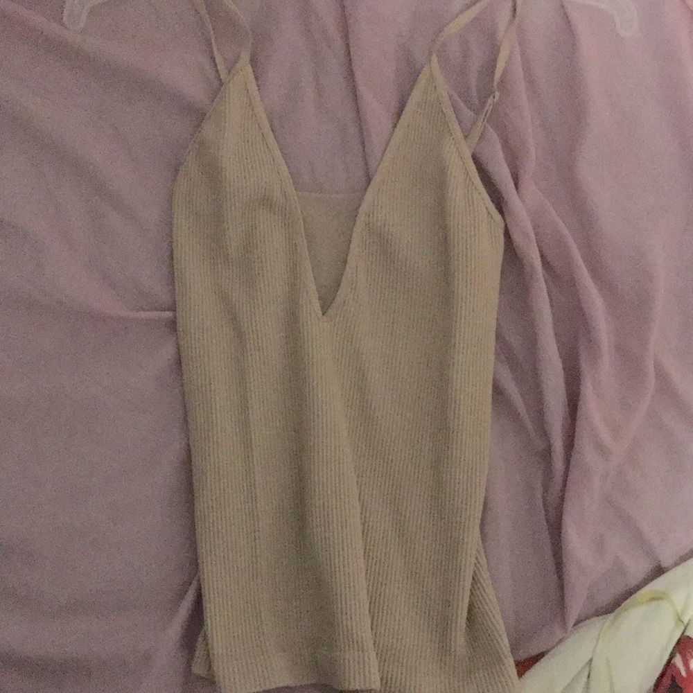 Free people tank lightly worn. Bought few years ago so it’s not on site anymore
